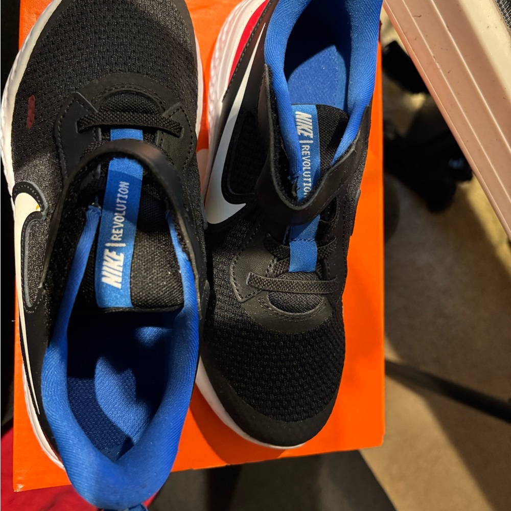 Nike Kids Revolution Shoes - Black and Blue with red detailing